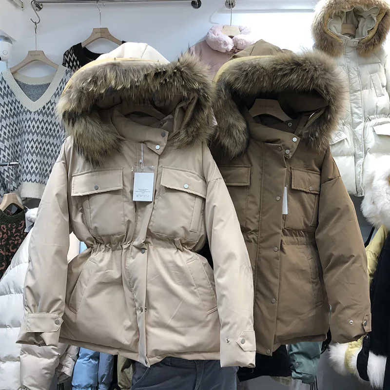 Универсальные студенческие пальто Новые Осенние Зимние приталенные куртки с капюшоном и воротником из меха енота женские стеганые куртки с длинным рукавом