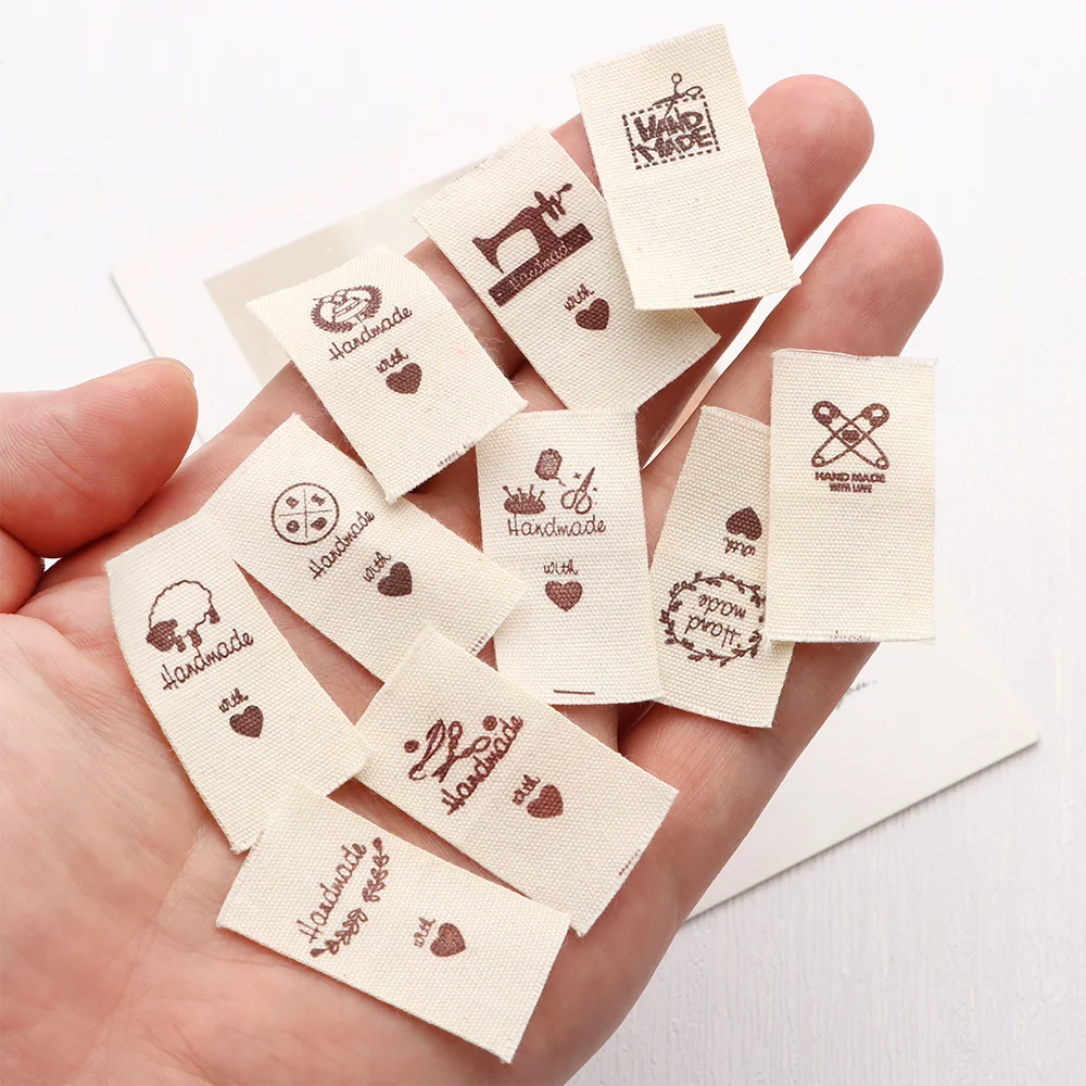 Description Picture 3 of item50PCS Heart Shape Cloth Garment Labels Cartoon Pattern Handmade With Love Clothing Tags Woven Knitted Supplies Sewing Accessory