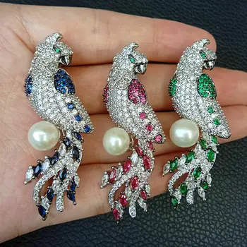 

White freshwater pearl golden plated Cubic Zirconia micro pave parrot brooch