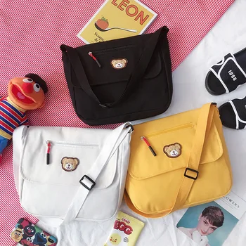 

Student models solid color shoulder bag canvas women bag new fashion small fresh crossbody bag bear models women bag