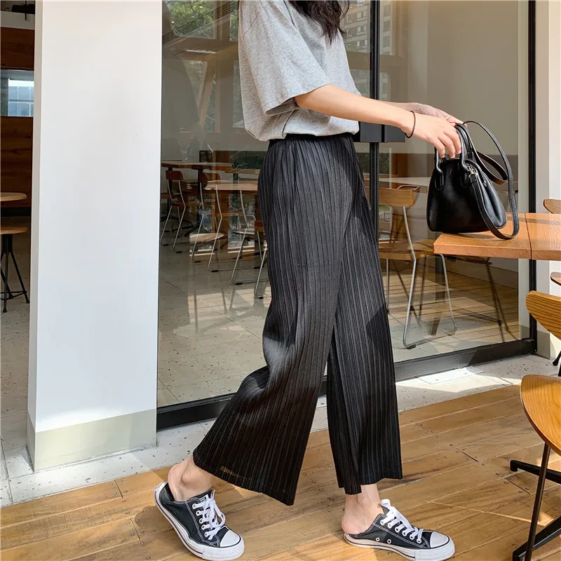 Miyake's loose slim wrinkled wide-legged pants and nine-minute pants free shipping