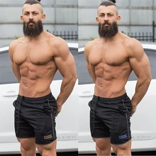 2019 authentic men's new fitness bodybuilding shorts men's gym exercise breathable quick-drying jogging beach shorts