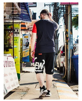 

Spring summer autumn muscle brother men's fitness loose beach pants five points pants running sports casual fashion shorts