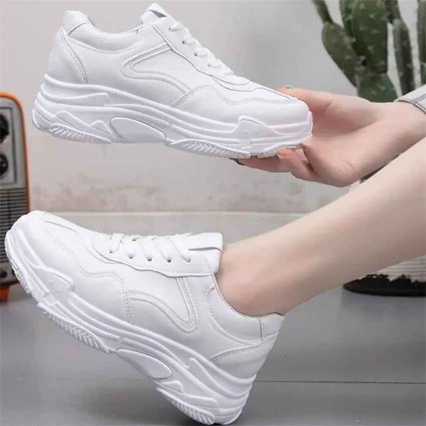 white chunky platform trainers