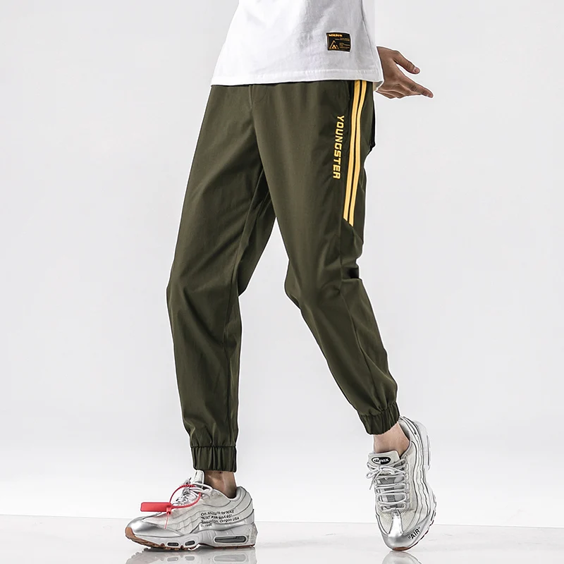 

Spring / summer 2020 trendy casual overalls men's loose straight nine point pants Korean fashion student