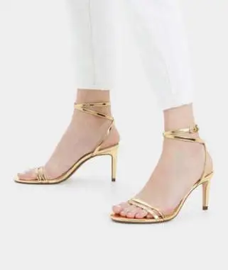 

Ashigo with the matching color snake sandals female word buckle cross with sponge cake platform shoes