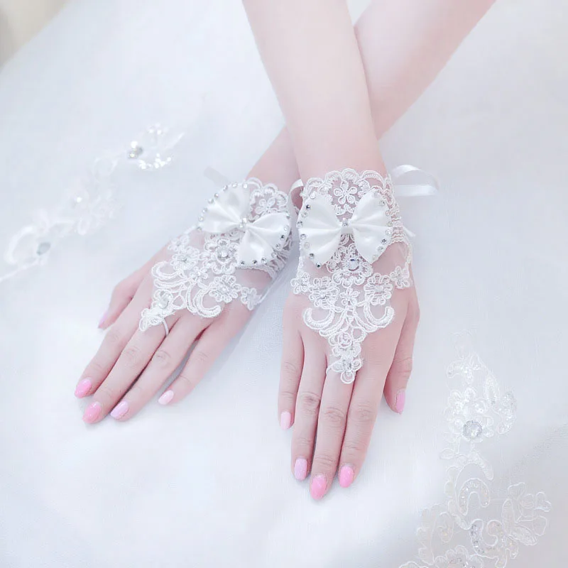 H04d7185bc3824304b80f9c8994d30050J Elegan Lace Short Bridal Gloves Inlaid Rhinestone Bowknot Slim Bridal Fingerless Gloves White Ivory Wedding Gown Accessories Mallzona