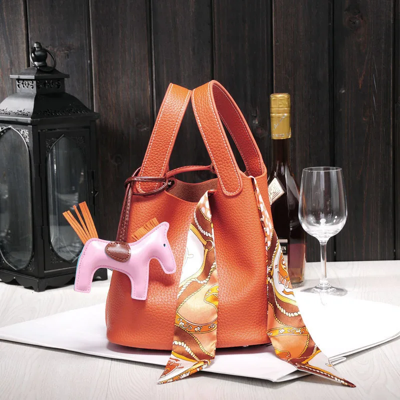 

2019 new cow Leather bag luxury design handbag TOGO lychee tote Fashion shoulder messenger bag Bucket bag Vegetable basket