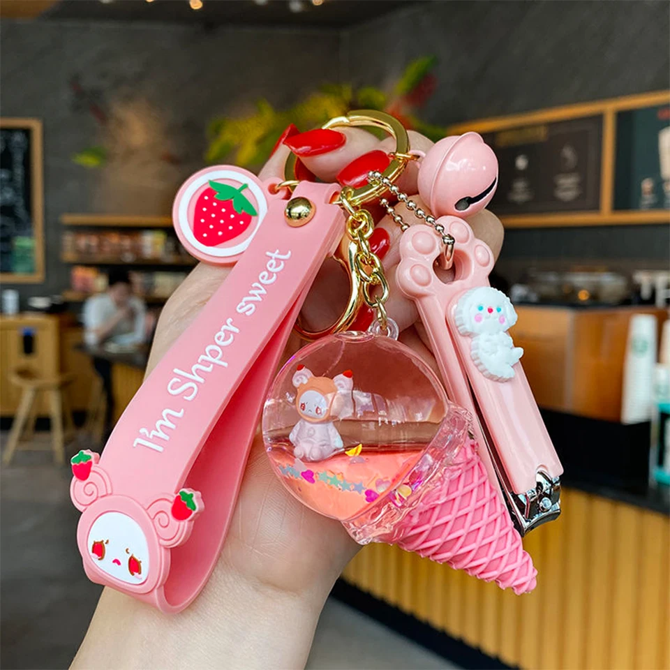 

New Cute Creative Crystal Ice Cream Keychain Luxury Floating Animal Moving Liquid Quicksand Keyring for Women Bag Pendant Keyfob