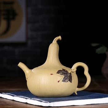 

Yixing recommended undressed ore all hand mud pumpkin pot capacity of 280 ml of new tea set