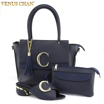 

Dark blue Italian design English letter C shoe buckle decoration matching bag, a collection of high-quality pointed shoes and ba