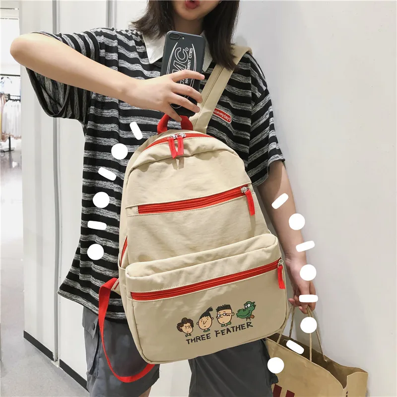 

Shoulder bag female Sina Korean primary and secondary school student bag nylon waterproof computer bag