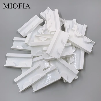 

Wholesale 100 pcs/pack transparent eyelash tray mink eyelash curler plastic eyelash rectangular tray eyelash packing box in bulk