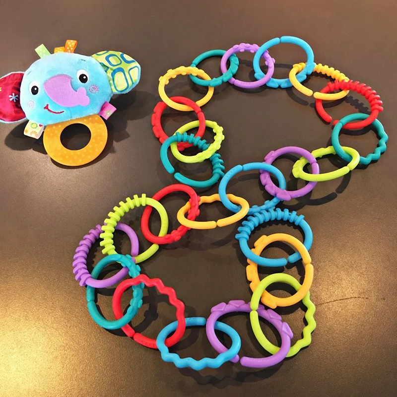 8Pcs/set Plastic Grip Baby Teether Rattles Rubber Rainbow Ring Molars Rattle Safety Toys for Children Crib Bed Stroller Hanging