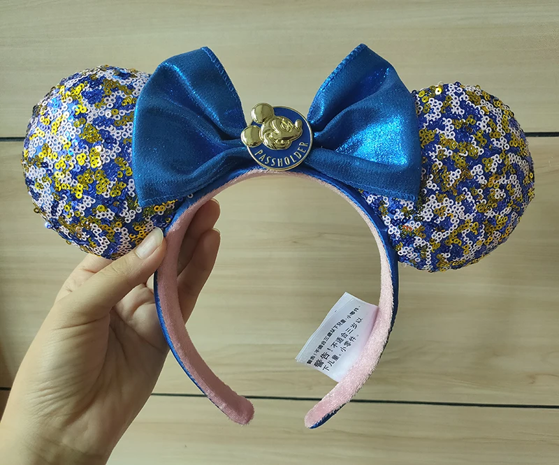 World Parks Annual Passholder Blue Sequined Minnie Bow Ears Headband