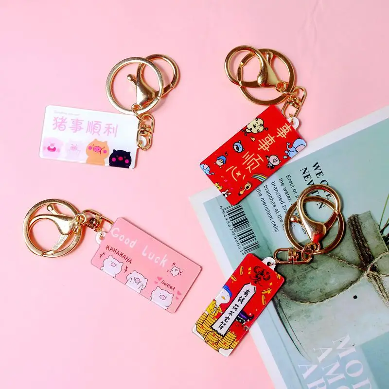 

2019 Network hong cayi Pigskin Small Fart Acrylic Keychain Holding Pieces Anime Cartoon Key Chain Handbag Pendant