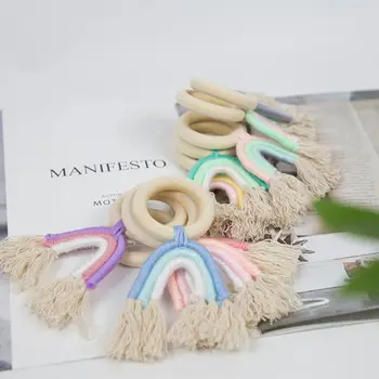 

Newborn Teether Woven Rainbow Hand Bell Ring Baby Teething Molar Bracelet