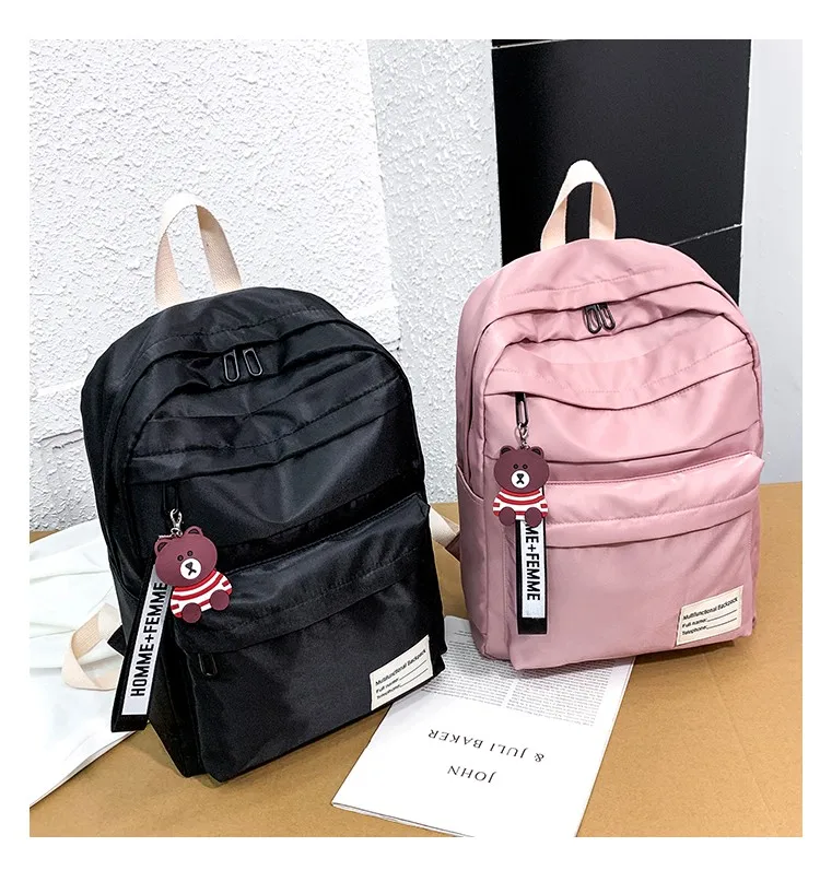 

New casual lady backpack large capacity schoolbag bear pendant backpack versatile double shoulder waterproof anti-theft backpack