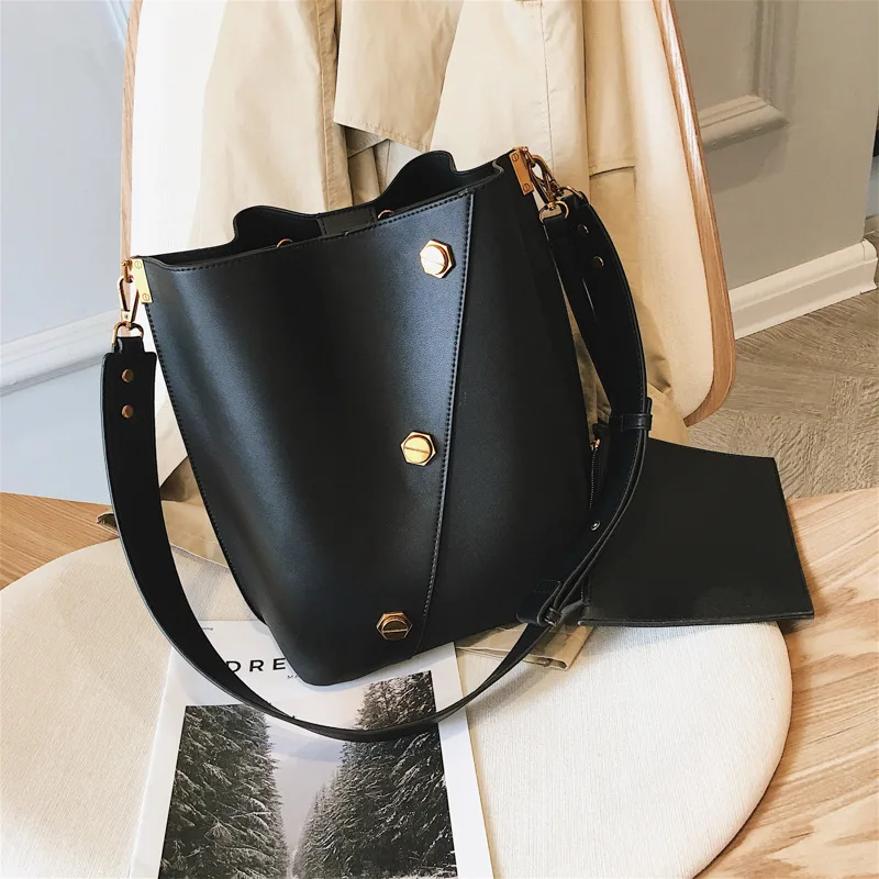 

Europe and the United States fan stereo large capacity bucket bag two-piece retro shoulder slung women's bag