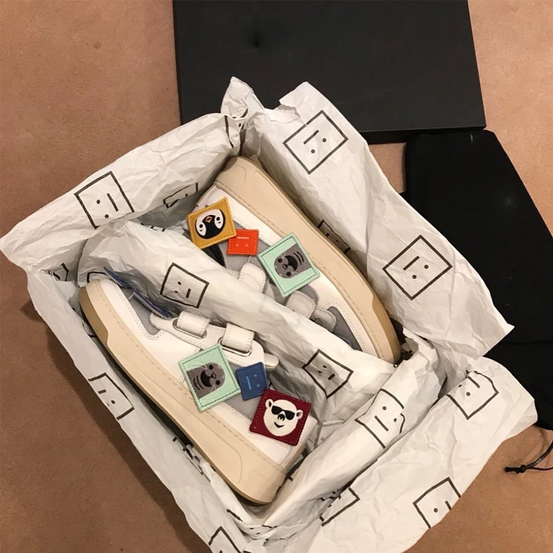 

Small White Shoes Female 2020 Season Cartoon Smiling Face Magic Paste Leisure Middle School Students Torre Shoes Sneakers