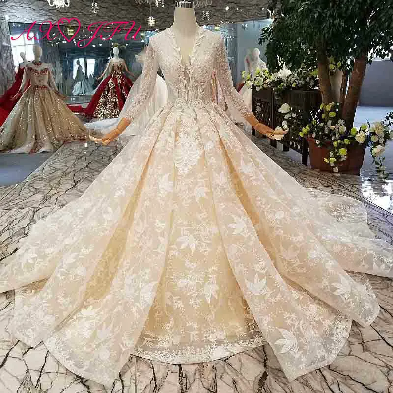 

AXJFU luxury princess beading pearls flower champagne lace wedding dress vintage v neck sparkly ruffles white wedding dress 202