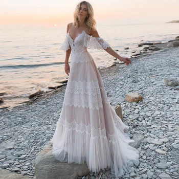Abiti da sposa bohémien allettante Nude Champagne scollo A V Chic maniche cinghie Ruffles Lace A Line Backless abiti da sposa