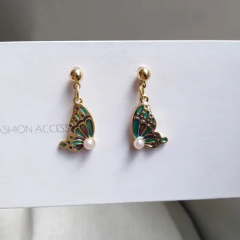 

DI-246 Personality temperament of contracted wind restoring ancient ways earrings butterfly modelling eardrop bump color pearl