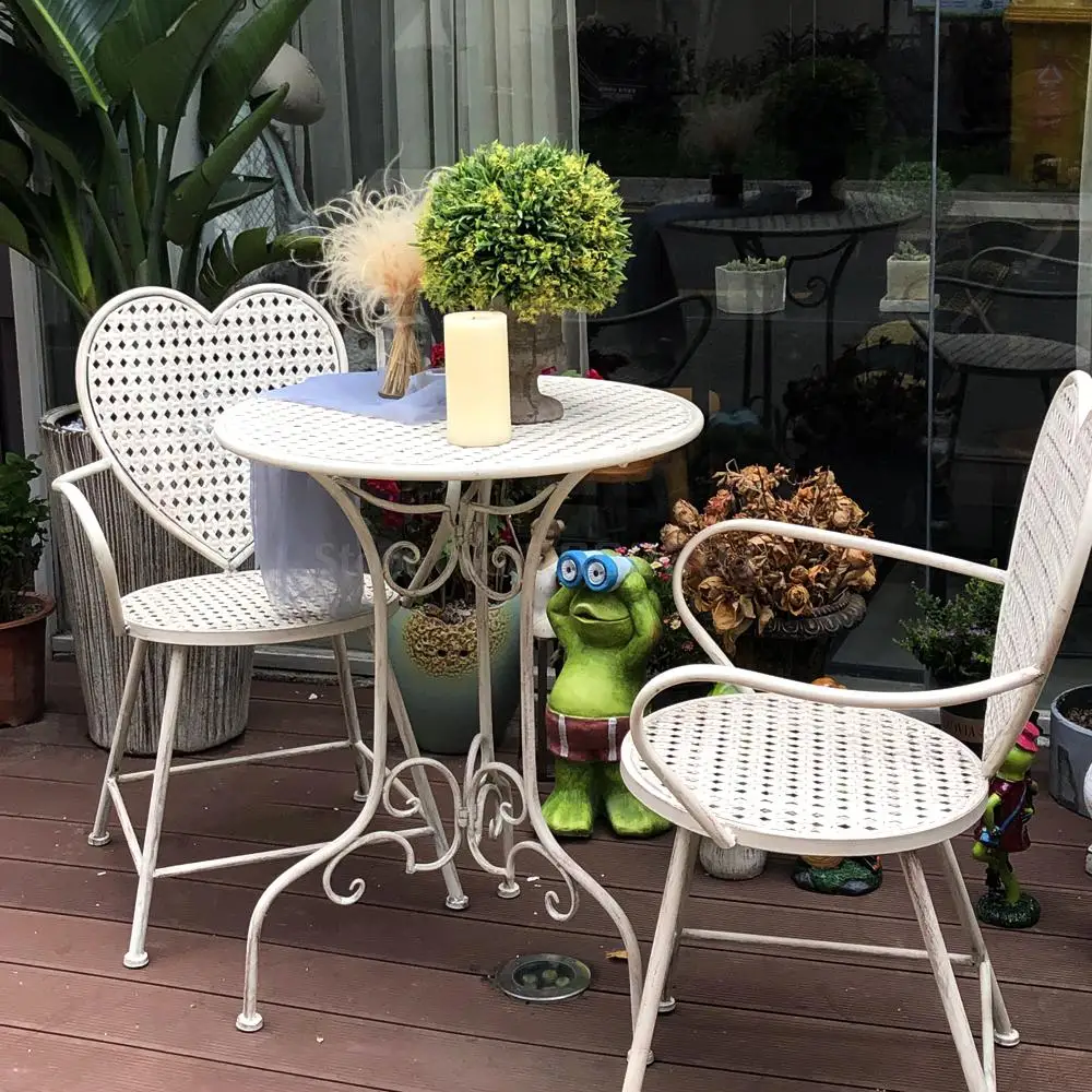  Outdoor garden table and chair three-piece combination wrought iron old art leisure home balcony heart-shaped |