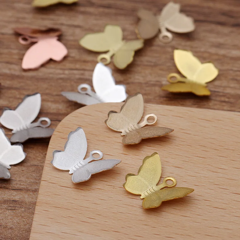 100-Uds-11x13mm-Metal-cobre-encanto-mariposa-de-filigrana-colgante-DIY-accesorios-de-joyer-a (1)