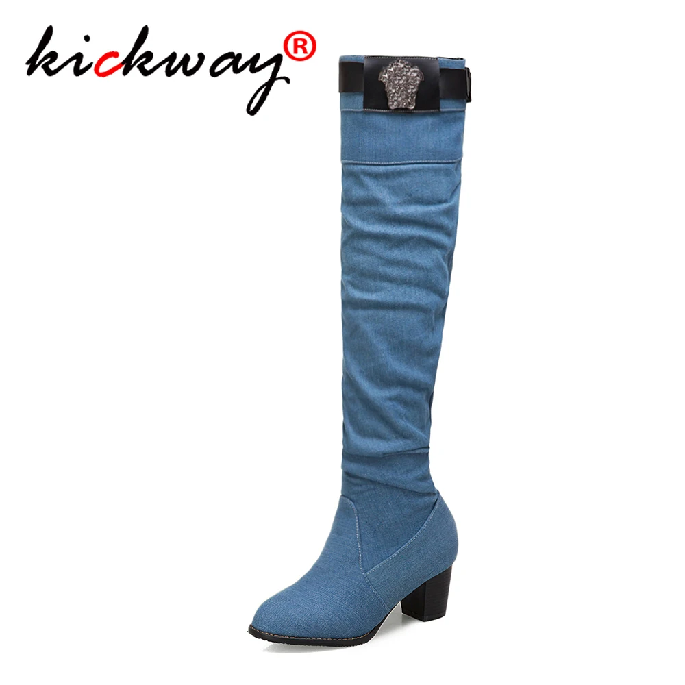 black knee high boots and jeans