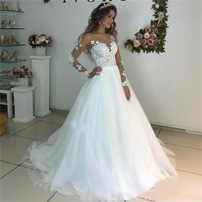 

Long Sleeves Tulle Lace Appliques Top Wedding Dress Buttons Bridal Gowns 2021 Spring Princess Bride Dress Formal Court Train