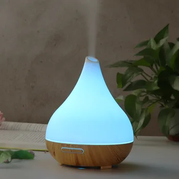 

On White Wood Grain Pointed Mouth Vase Mini Air Purifier Aroma Diffuser Gift Humidifier for Drop Shipping