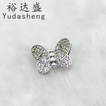 

Butterfly retaining clip. It is inlaid with sparkling honey-colored cubic zirconia and pink crystals