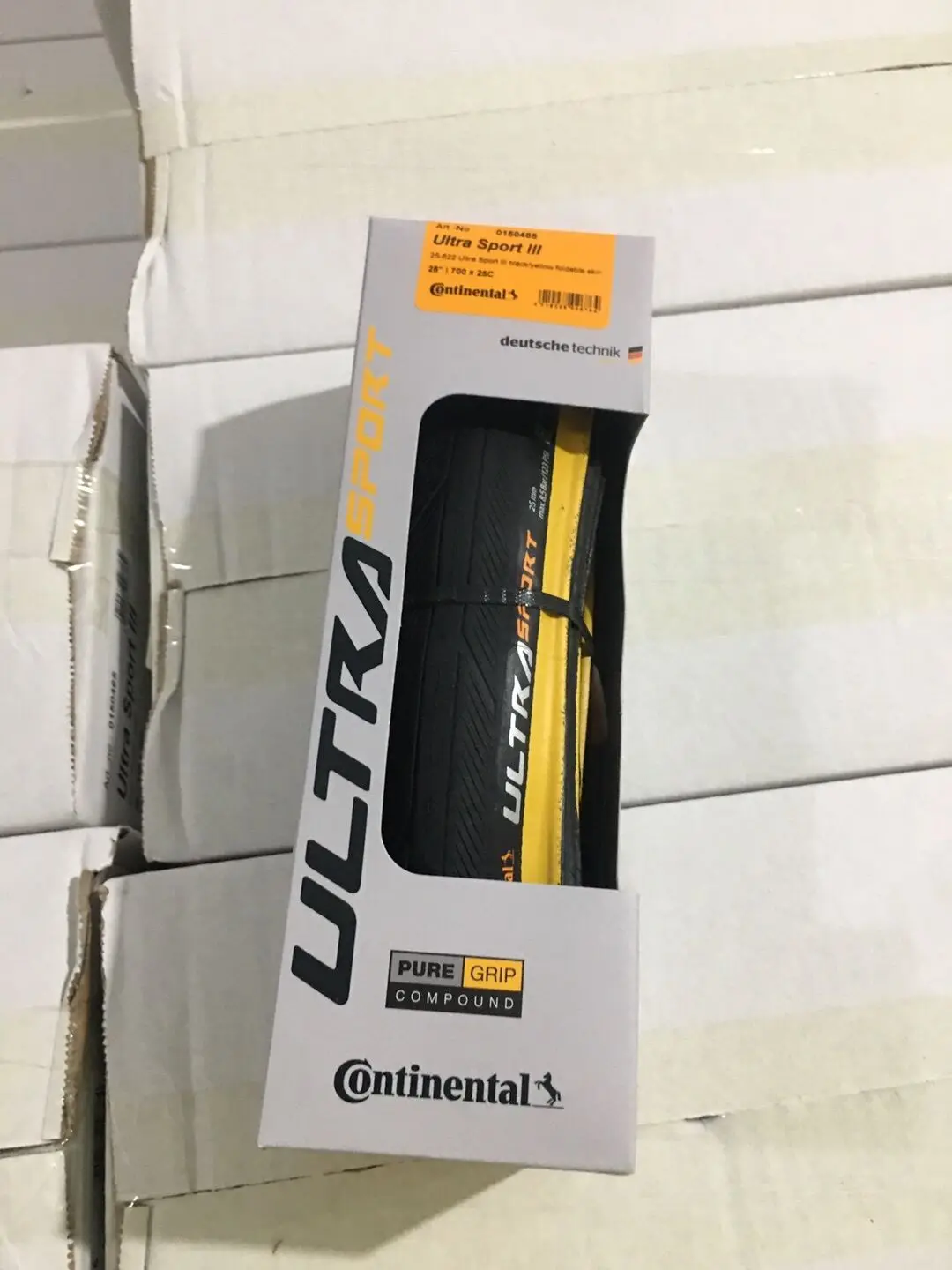 Шина для дорожного велосипеда Continental Ultra Sport III 700x25 черно желтая складная PureGrip