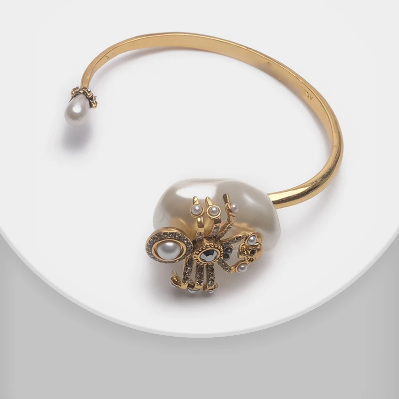 

Exquisite spider design pearl insect bangle