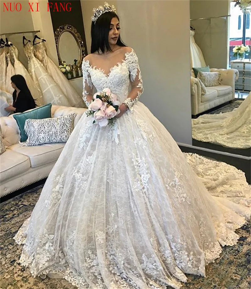 

Amazing New Puffy Wedding Dresses 2020 Sheer Scoop Neck Long Sleeves Ball Gown Cou'r't Train Beaded Lace Bride Dress mariage