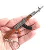 Chicken around AKM AK-47 gun keychain pendant pendant ornaments 1