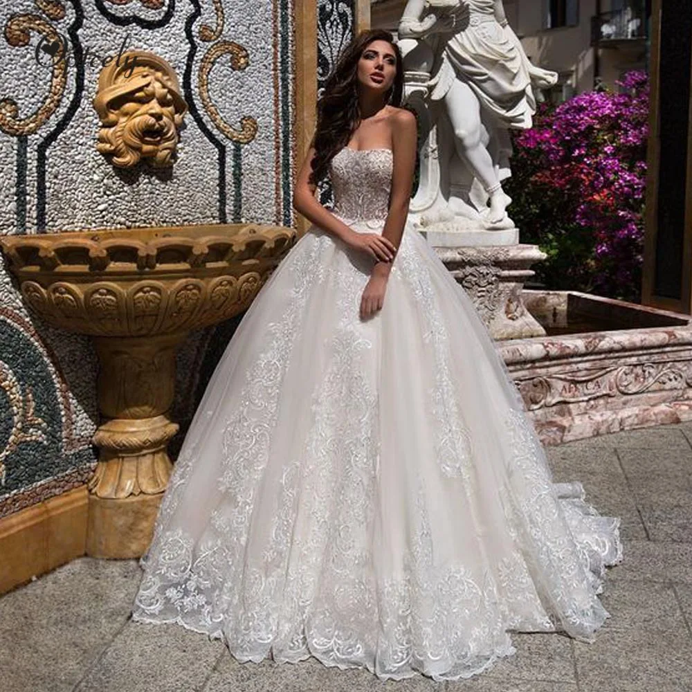 

Optcely New Arrival Gorgeous Formal Strapless A-Line Wedding Dress 2019 High Quality Appliques Court Train Bridal Gown Plus Size