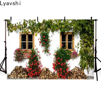 

Lyavshi rural background red flowers firewood white wall green vine photo background photo studio photography