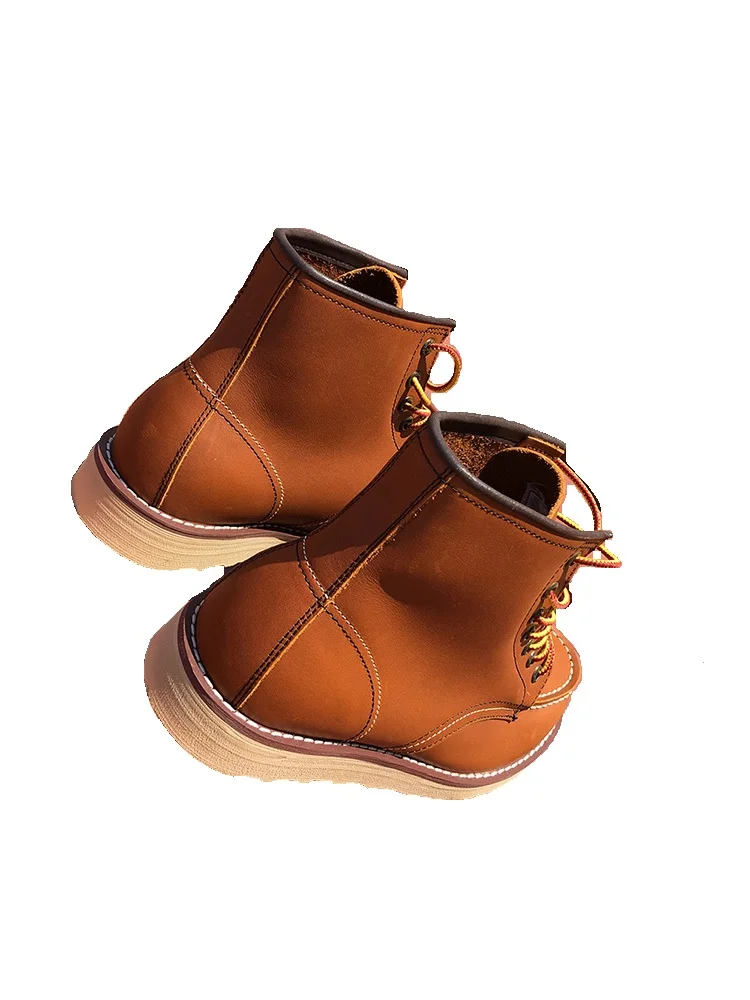 botas de tornozelo dos homens ao ar