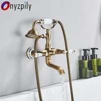 Onyzpily Bathtub Shower Faucet Antique ORB Golden Phone Style  Spray Wall-Mounted Hot And Cold Faucet Blue and White Porcelain 1