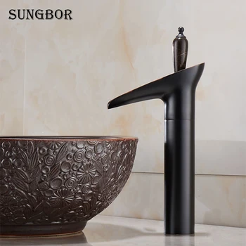

Nordic minimalist wash basin hot and cold water faucet creative wine glass waterfall type above counter basin jade faucet