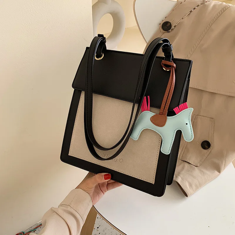 

2019 Autumn New Style WOMEN'S Bag British Style Verticle ti xing bao Simple Contrast Color Dull Polish Bag Cute Pony Pendant