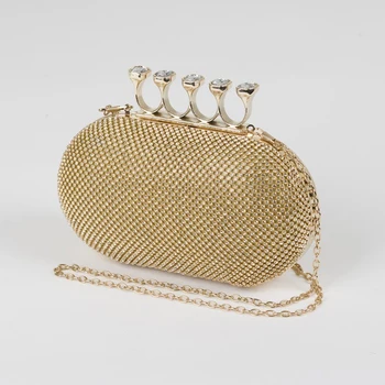 

Women's clutch, section on the clasp, long chain, gold color