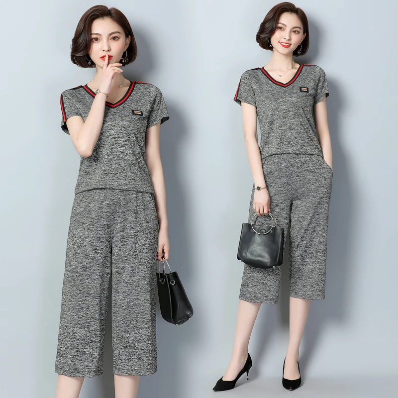 

Large size wide leg pants suit casual short sleeve two piece set tracksuit for women crop top women two piece set top and pants
