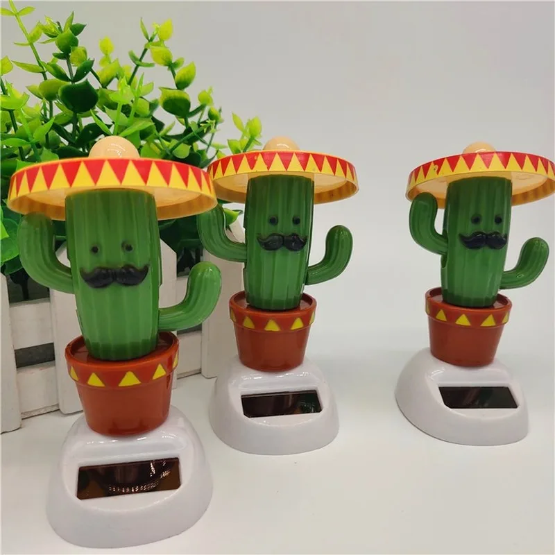 

1Pcs Cute Creative Green Cactus Hat Image Children Entertainment Dolls Toys Automatic Swing Solar Toys Automobile Decor Supplies