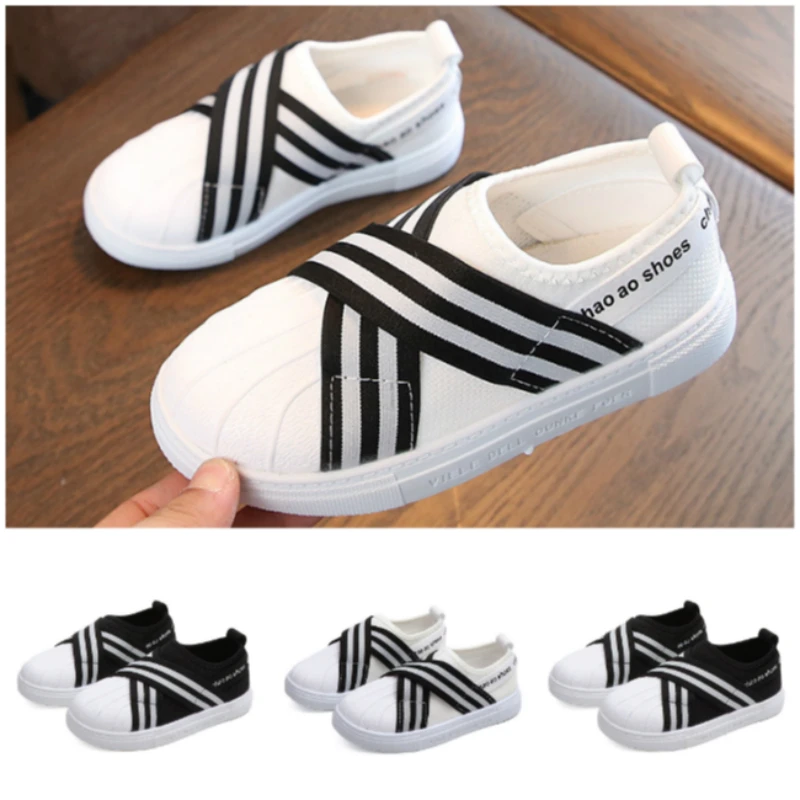 white canvas baby shoes