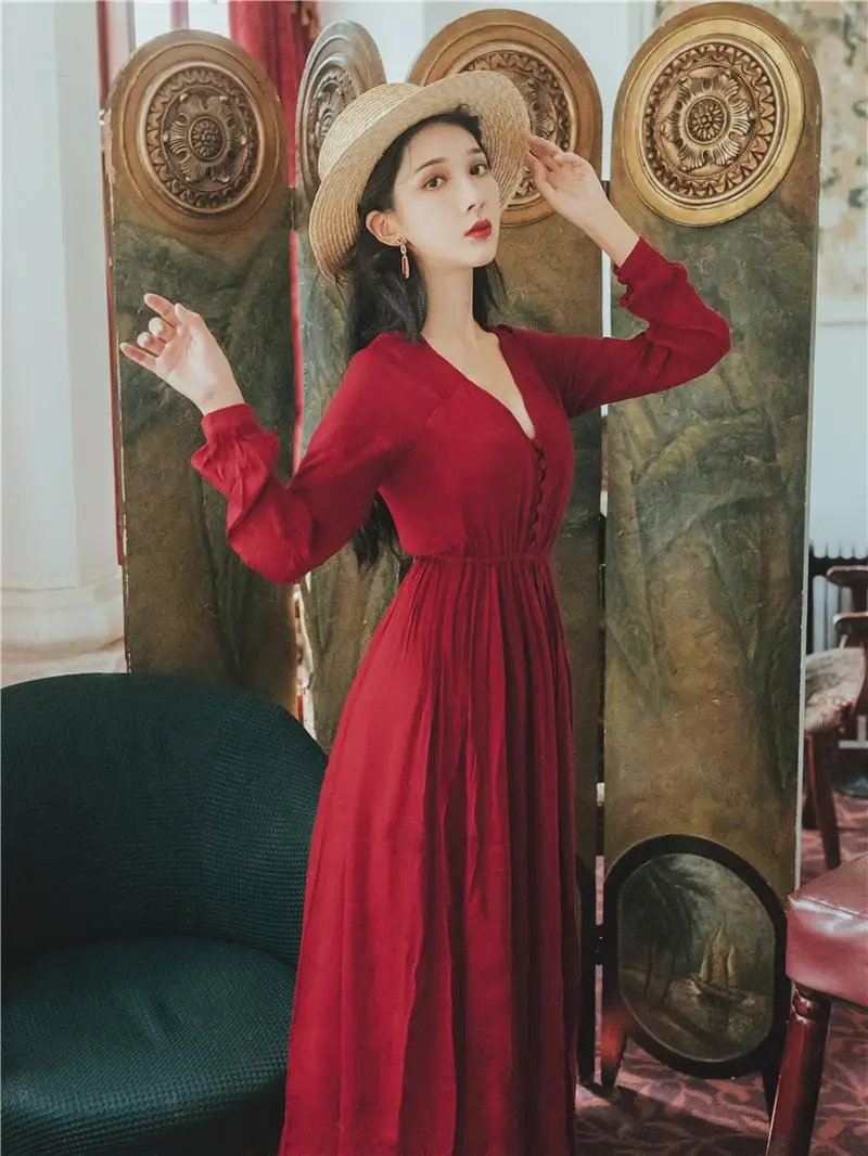 Early autumn new long-sleeved dress long lantern sleeve cotton and linen dress red beach dress scene shooting