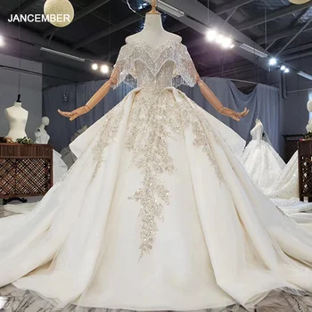 شراءHTL1653 خرز شرابة كبيرة على الصدر فستان زفاف على شكل قصر على شكل قلب 2020 قصير الأكمام ثوب حفلة أماندا نوفيا