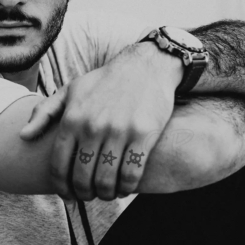 タトゥーステッカー漫画ハロウィン死神星の頭蓋骨のクロス一時的な水転写偽タトゥーファッションタトゥー子供男女の子 消えるタトゥー Aliexpress